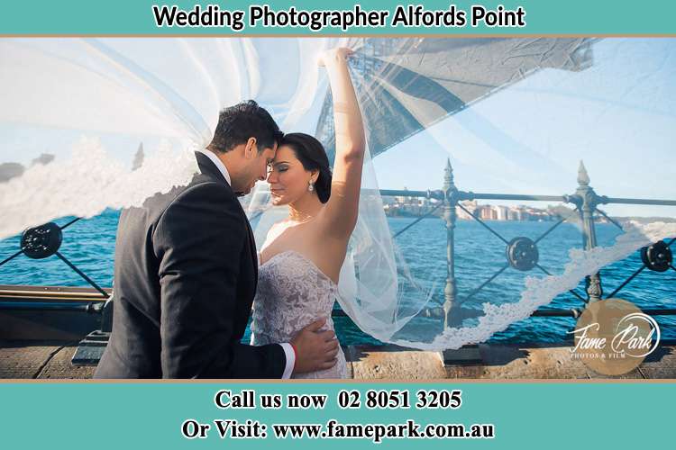 Photo of the Groom and the Bride kissing Alfords Point NSW 2234