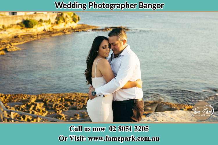 Photo of the Bride and the Groom hugging near the lake Bangor NSW 2234