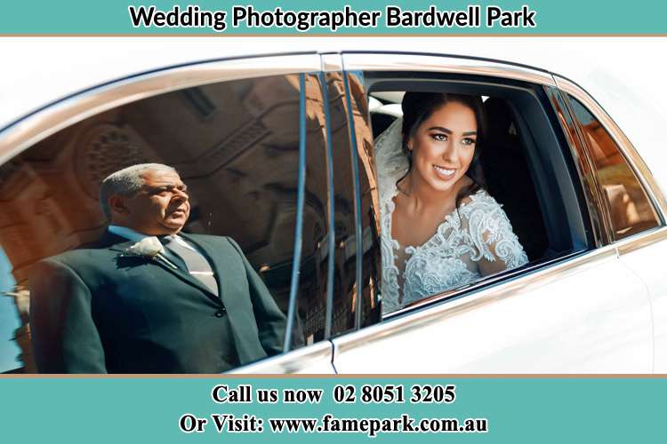 Photo of the Bride inside the bridal car with her father standing outside Bardwell Park NSW 2207