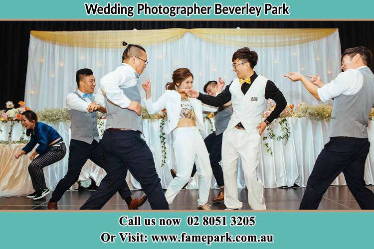 Photo of the Groom and the Bride dancing with the groomsmen at the dance floor Beverley Park NSW 2207