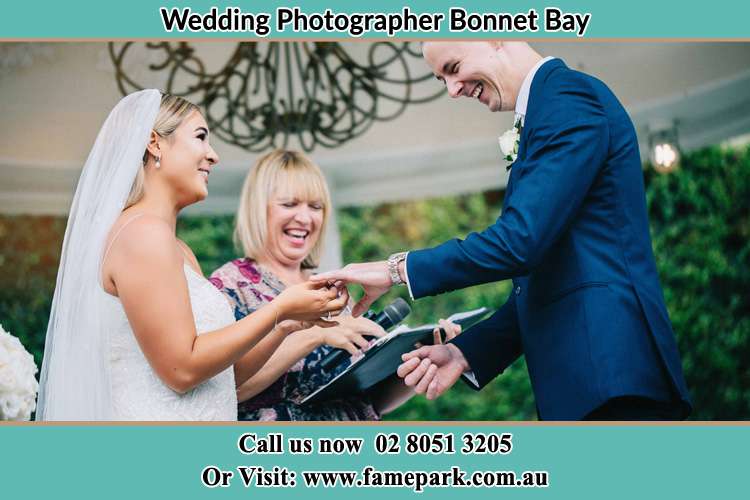 Photo of the Bride wearing ring to the Groom Bonnet Bay NSW 2226