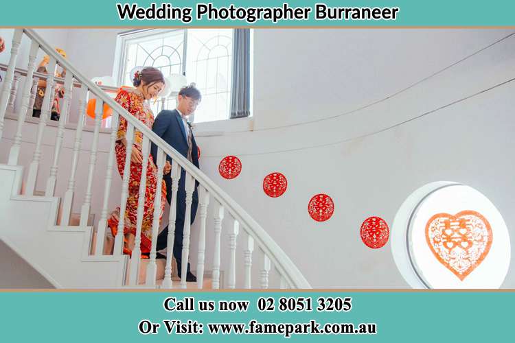 Photo of the Bride and the Groom going down the stair Burraneer NSW 2230