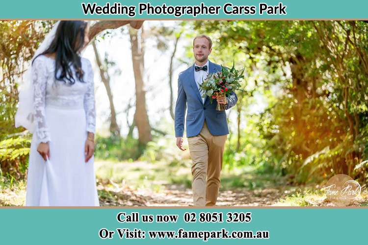 Photo of the Groom bringing flower to the Bride Carss Park NSW 2221