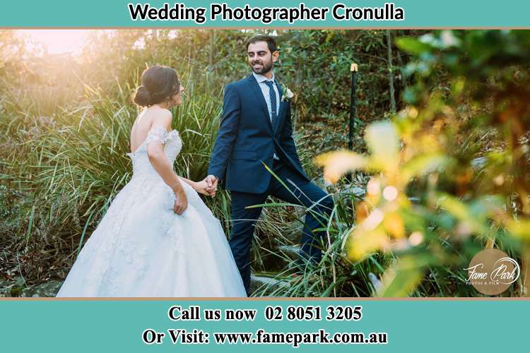 Photo of the Bride and the Groom going up the hill Cronulla NSW 2230