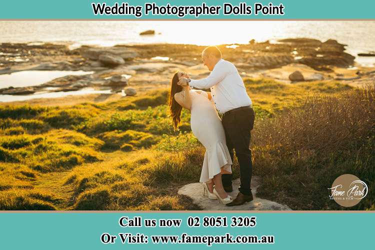 Photo of the Bride and the Groom dancing near the lake Dolls Point NSW 2219