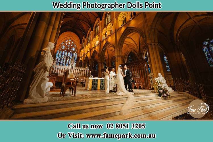 Photo of the Bride and the Groom at the altar Dolls Point NSW 2219