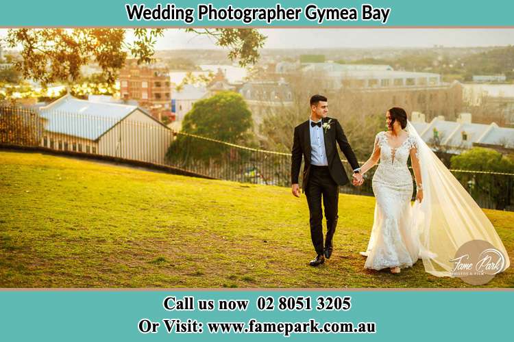 Photo of the Groom and the Bride walking at the yard Gymea Bay NSW 2227