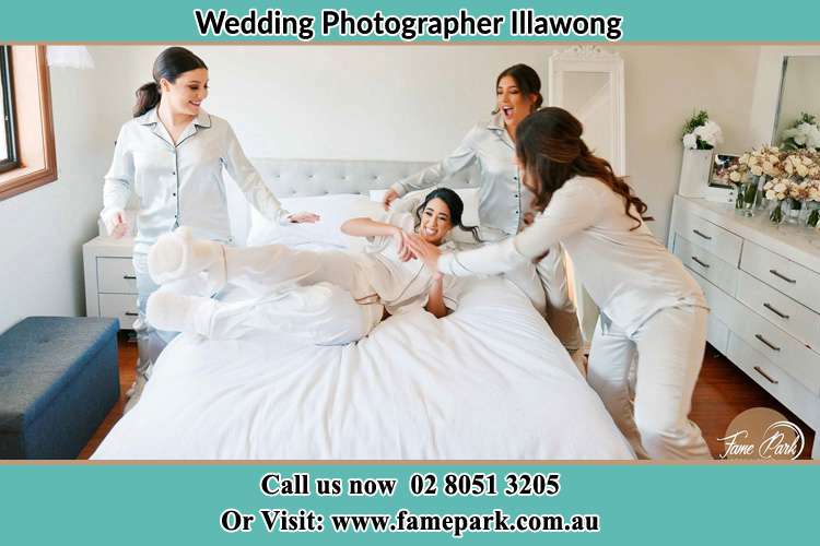 Photo of the Bride and the bridesmaids play on bed Illawong NSW 2234