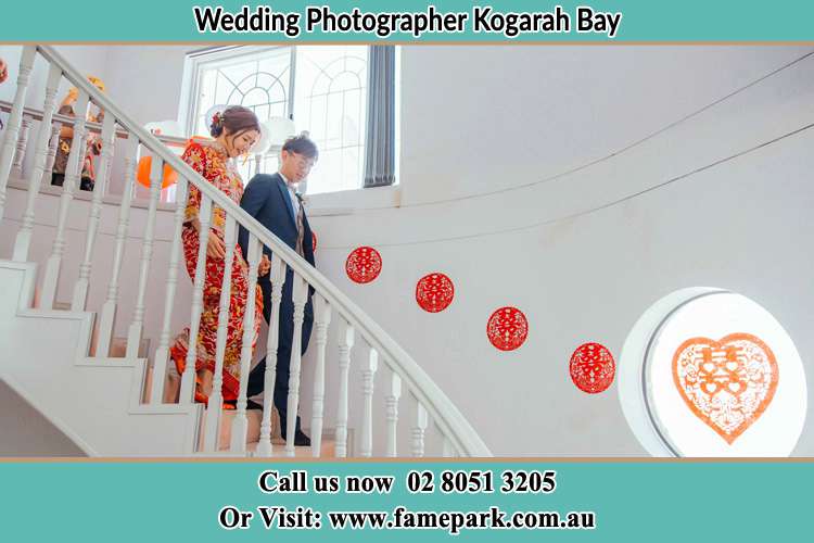 Photo of the Bride and the Groom going down the stair Kogarah Bay NSW 2217