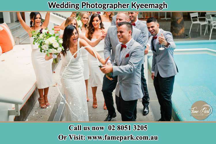 Photo of the Groom and the Bride celebrating with the secondary sponsors Kyeemagh NSW 2216