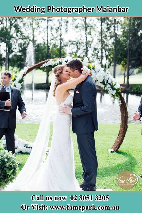 Photo of the Bride and the Groom kissing Maianbar NSW 2230