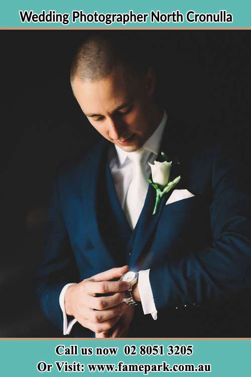 Photo of the Groom checking the time North Cronulla NSW 2230