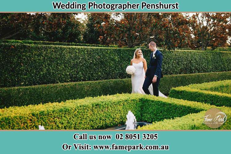 Photo of the Bride and the Groom walking at the garden Penshurst NSW 2222