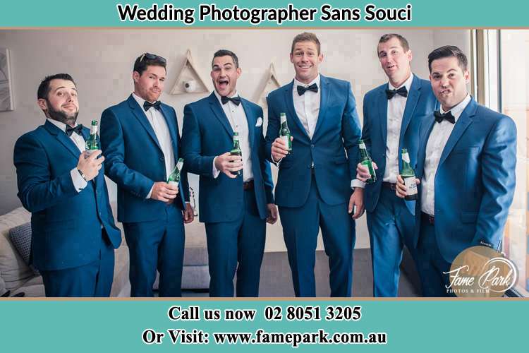 The groom and his groomsmen striking a wacky pose in front of the camera Sans Souci NSW 2219