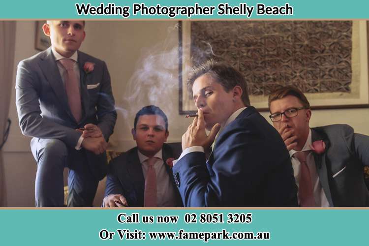 Photo of the Groom and the groomsmen relaxing Shelly Beach NSW 2261